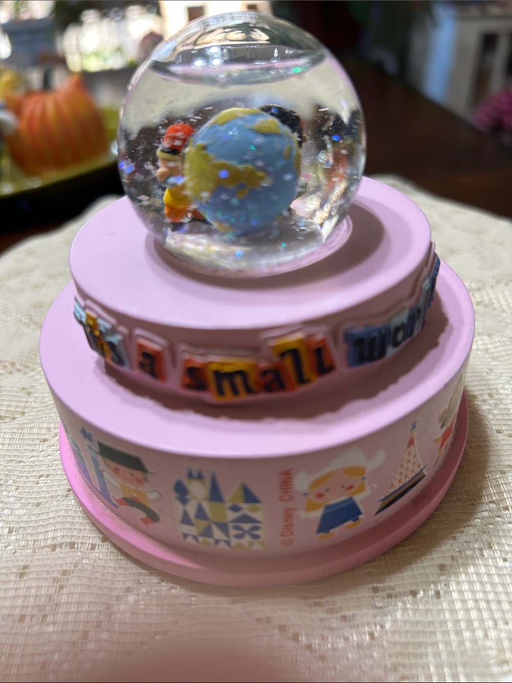 Disney Parks “It’s a Small World” Musical Snow Globe On a Tiered Pink Base - Picture 4 of 8